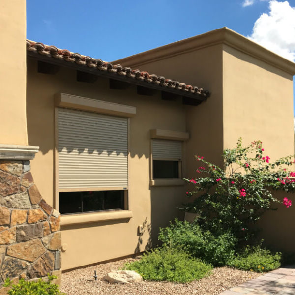 Rolling shutters on side windows of a Tucson, Arizona home