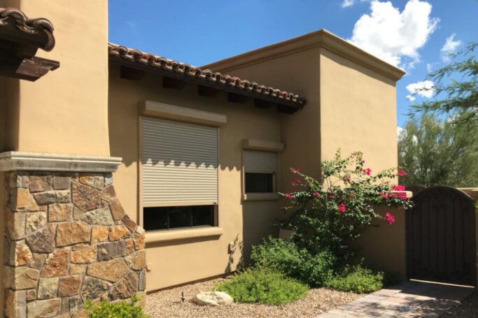 Rolling shutters on side windows of a Tucson, Arizona home