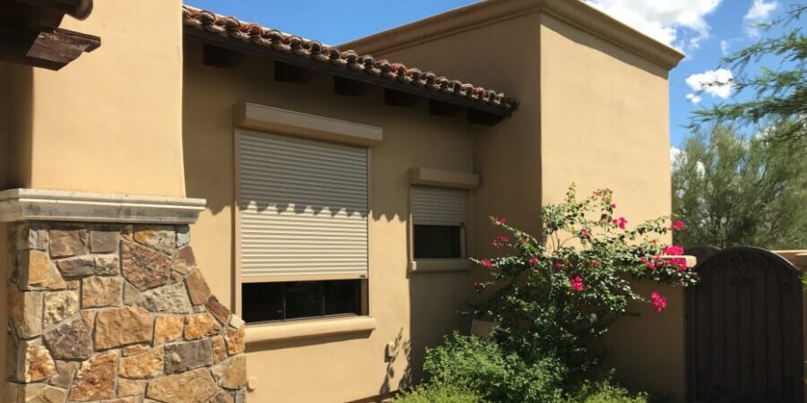 Rolling shutters on side windows of a Tucson, Arizona home