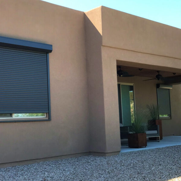 Rolling shutters on side window of a Tucson, Arizona home