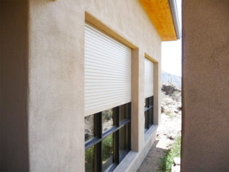 Rolling shutters on exterior of a Tucson, Arizona home
