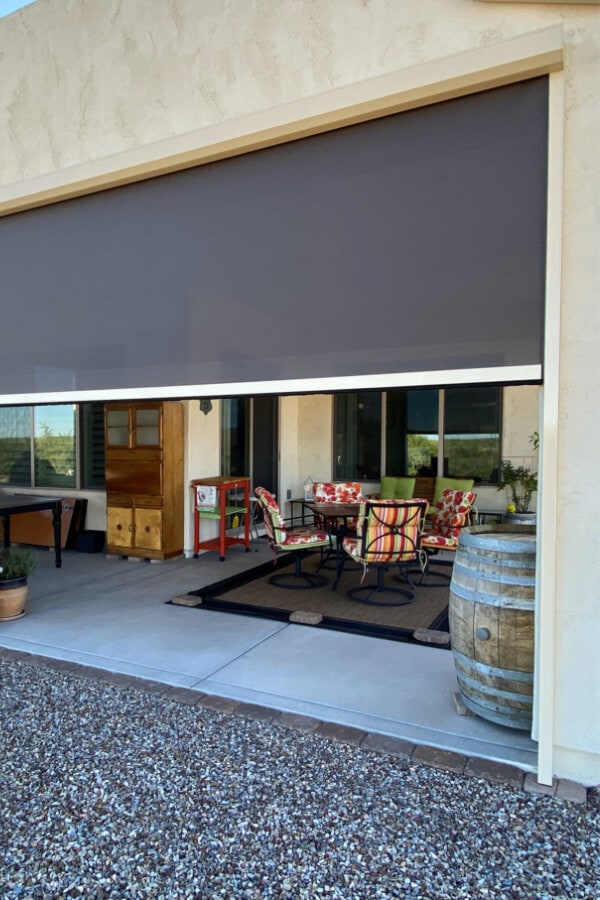 Home in Tucson, Arizona with retractable solar screens shading the patio