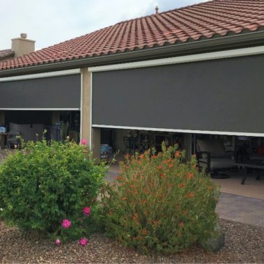 Home in Tucson, Arizona with retractable solar screens shading the patio