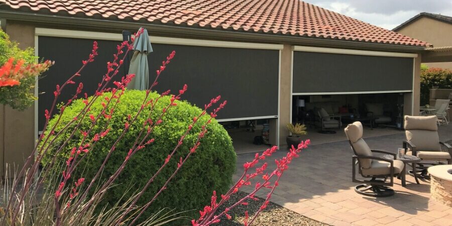 Home in Tucson, Arizona with retractable solar screens blocking the patio