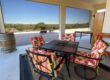 Retractable solar screens shading the patio of a Tucson, Arizona home