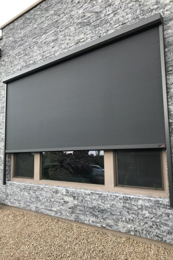 Home in Tucson, Arizona with retractable solar screens shading the windows