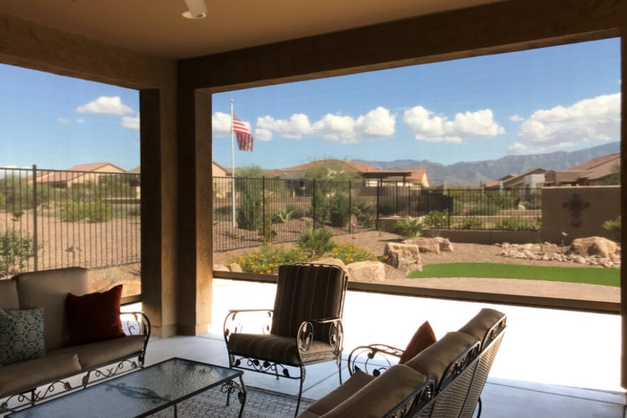 Home in Tucson, Arizona with retractable solar screens shading the patio