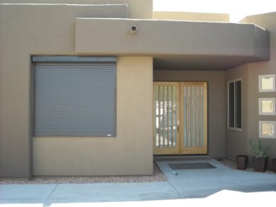 Rolling shutters on exterior window of a Tucson, Arizona home
