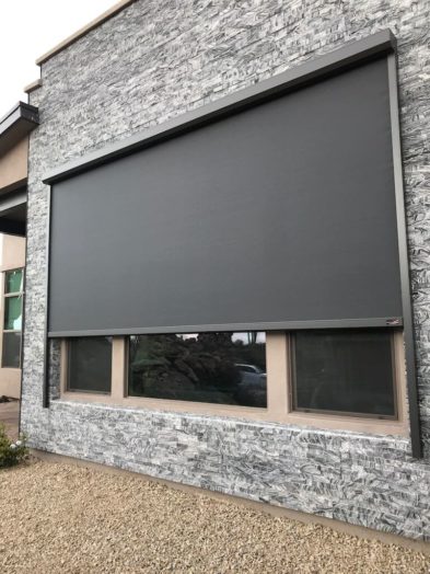 Solar screens protecting exterior of a Tucson, Arizona home