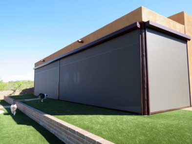 Extra large rolling screen shading patio of a Tucson, Arizona home