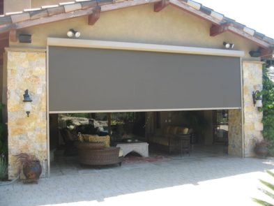 Extra large rolling screen shading patio of a Tucson, Arizona home