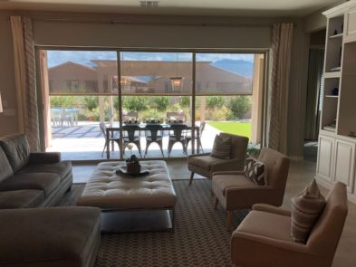 Extra large rolling screen shading patio of a Tucson, Arizona home