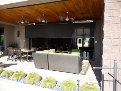 Extra large rolling screen shading patio of a Tucson, Arizona home