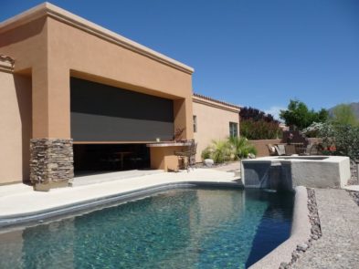 Extra large rolling screen shading patio of a Tucson, Arizona home