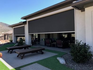 Extra large rolling screen shading patio of a Tucson, Arizona home