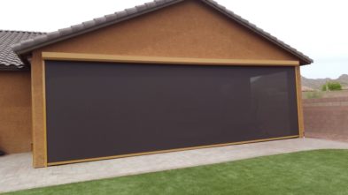 Extra large rolling screen shading patio of a Tucson, Arizona home