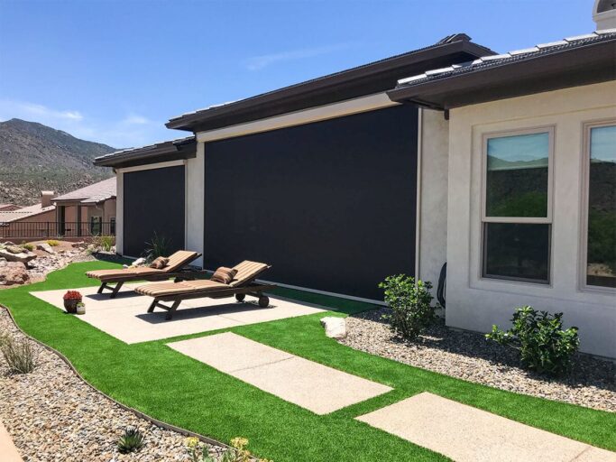 Dark solar screens on light colored house