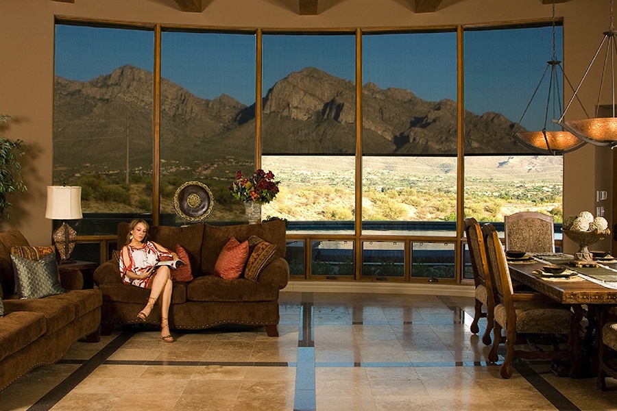 Rolling sun shades Tucson protecting the interior of a home