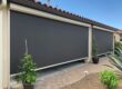 Solar shades providing privacy and heat protection for an Arizona home