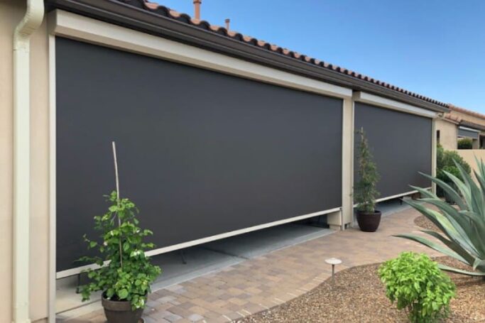 Solar shades providing privacy and heat protection for an Arizona home